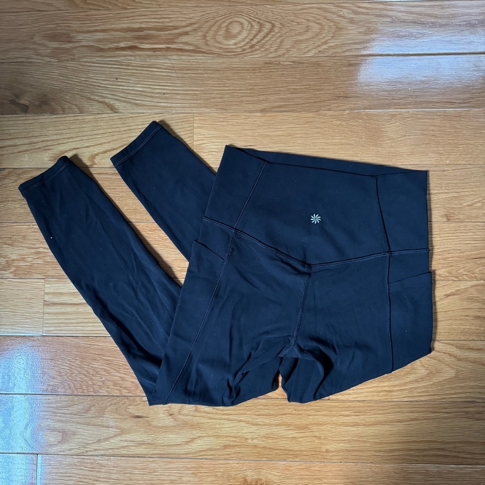 Athleta Salutation Stash leggings size XS